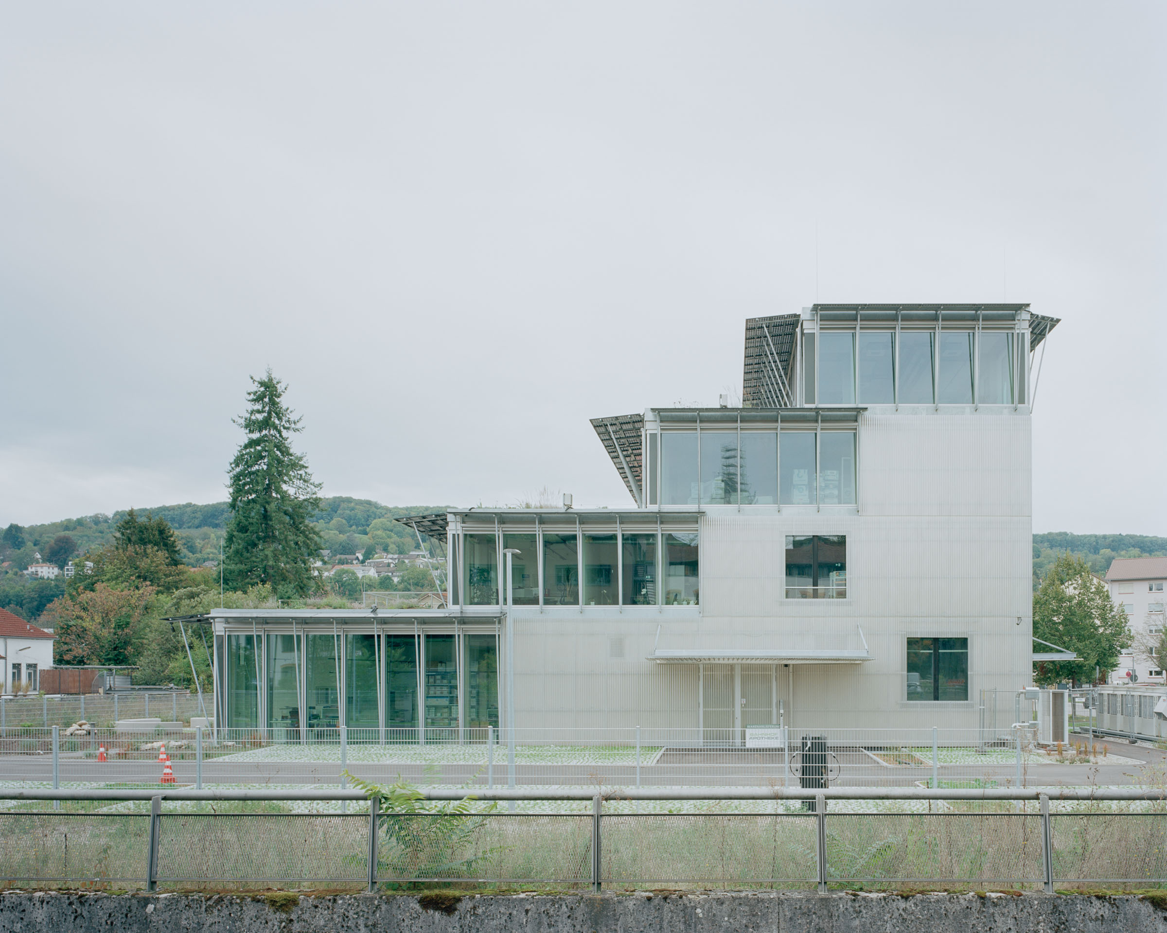 Analog architectural photography and documentation of the exterior of the Lab02 building in Lörrach, Germany, designed by Mulder Zonderland. Photographed by Piotr Hraptovich, architectural photographer based in Basel, Switzerland. Analoge Architekturfotografie und Dokumentation der Aussensicht des Lab02 Gebäudes in Lörrach, Deutschland, entworfen von Mulder Zonderland. Fotografiert von Piotr Hraptovich, Architekturfotograf mit Sitz in Basel, Schweiz. 