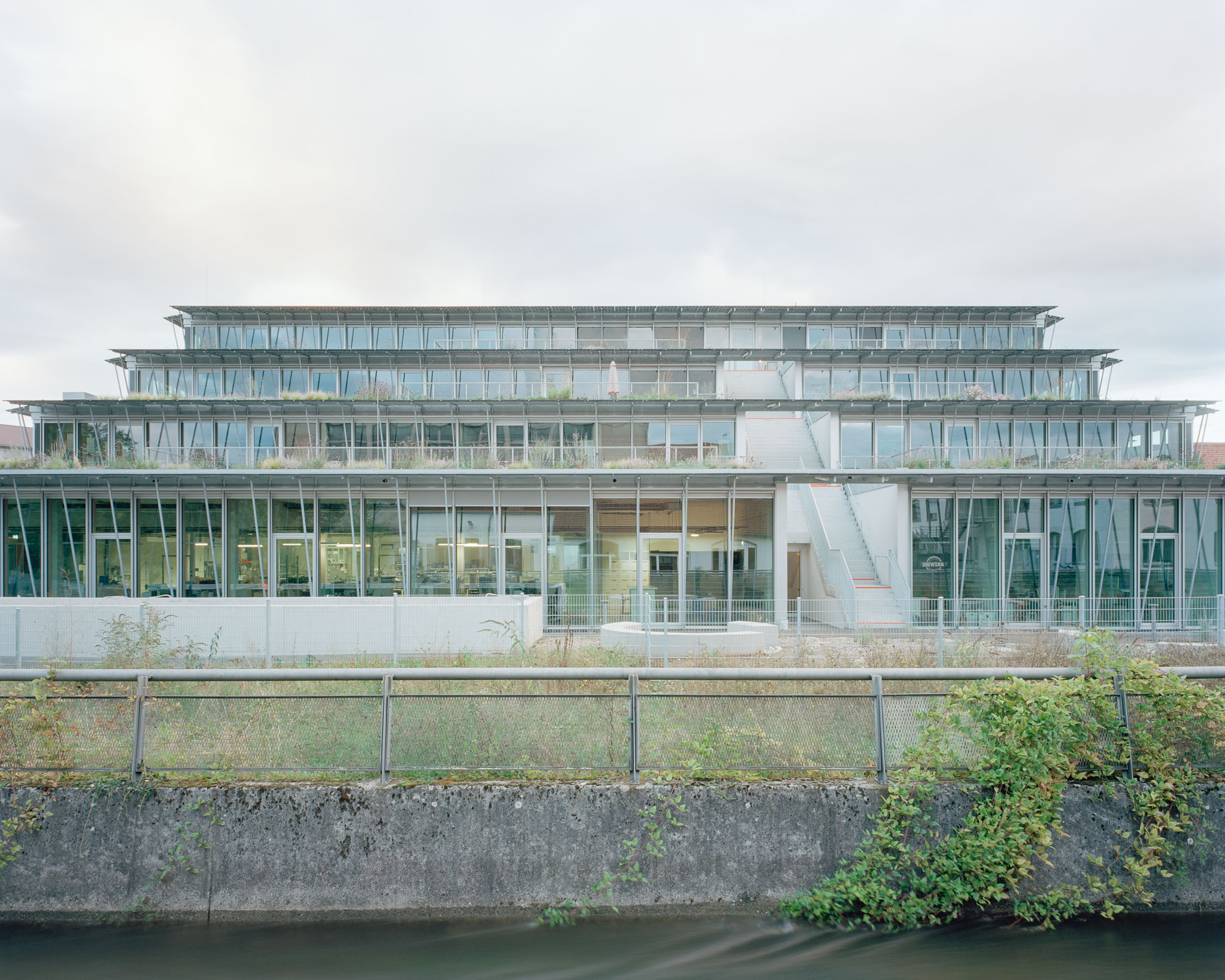 Analog architectural photography and documentation of the exterior of the Lab02 building in Lörrach, Germany, designed by Mulder Zonderland. Photographed by Piotr Hraptovich, architectural photographer based in Basel, Switzerland. Analoge Architekturfotografie und Dokumentation der Aussensicht des Lab02 Gebäudes in Lörrach, Deutschland, entworfen von Mulder Zonderland. Fotografiert von Piotr Hraptovich, Architekturfotograf mit Sitz in Basel, Schweiz. 